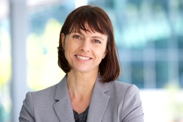Women executive in suit with short hair